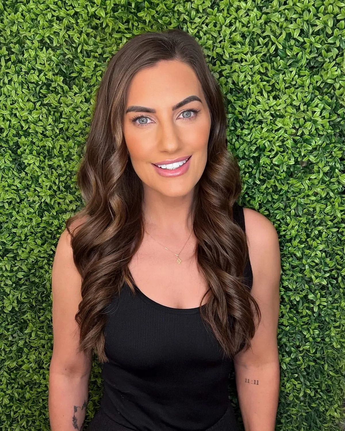 Full glam makeup with a sculpted cheek and glossy lip