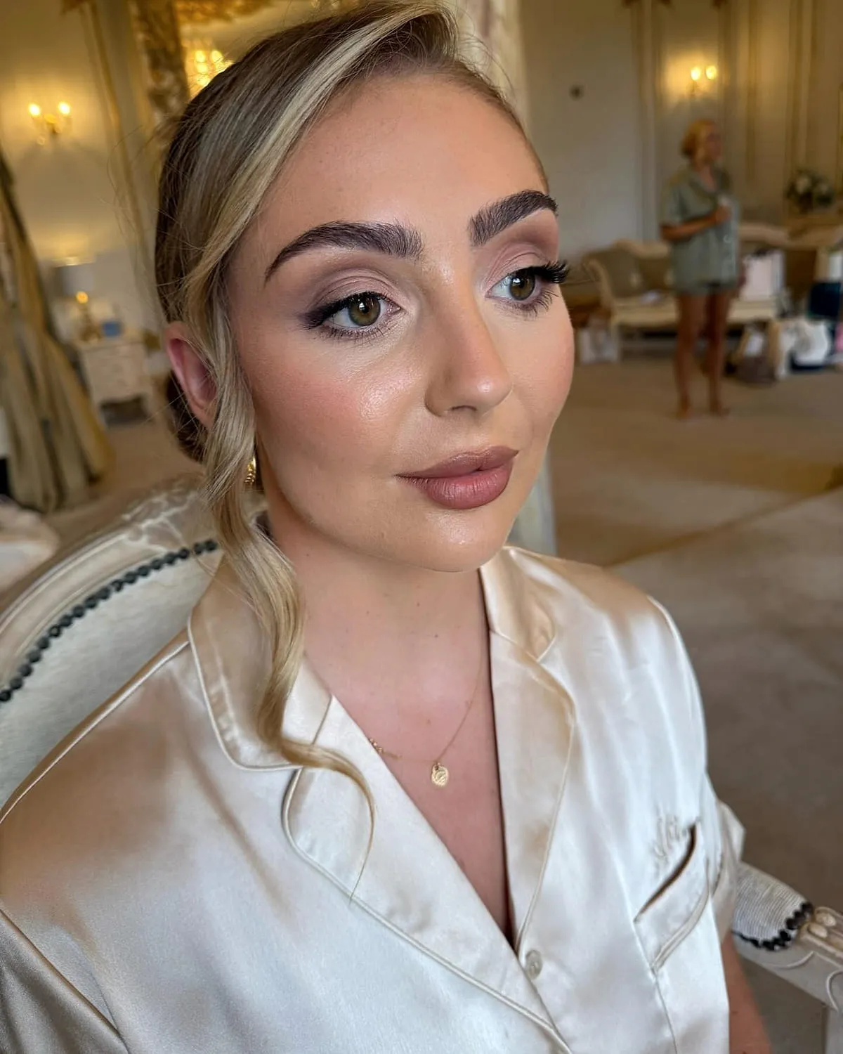 Soft glam occasion makeup with a warm neutral eye