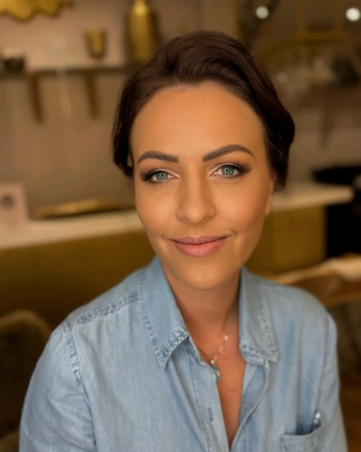 Bridal makeup with a defined brow and softly blended neutral eye