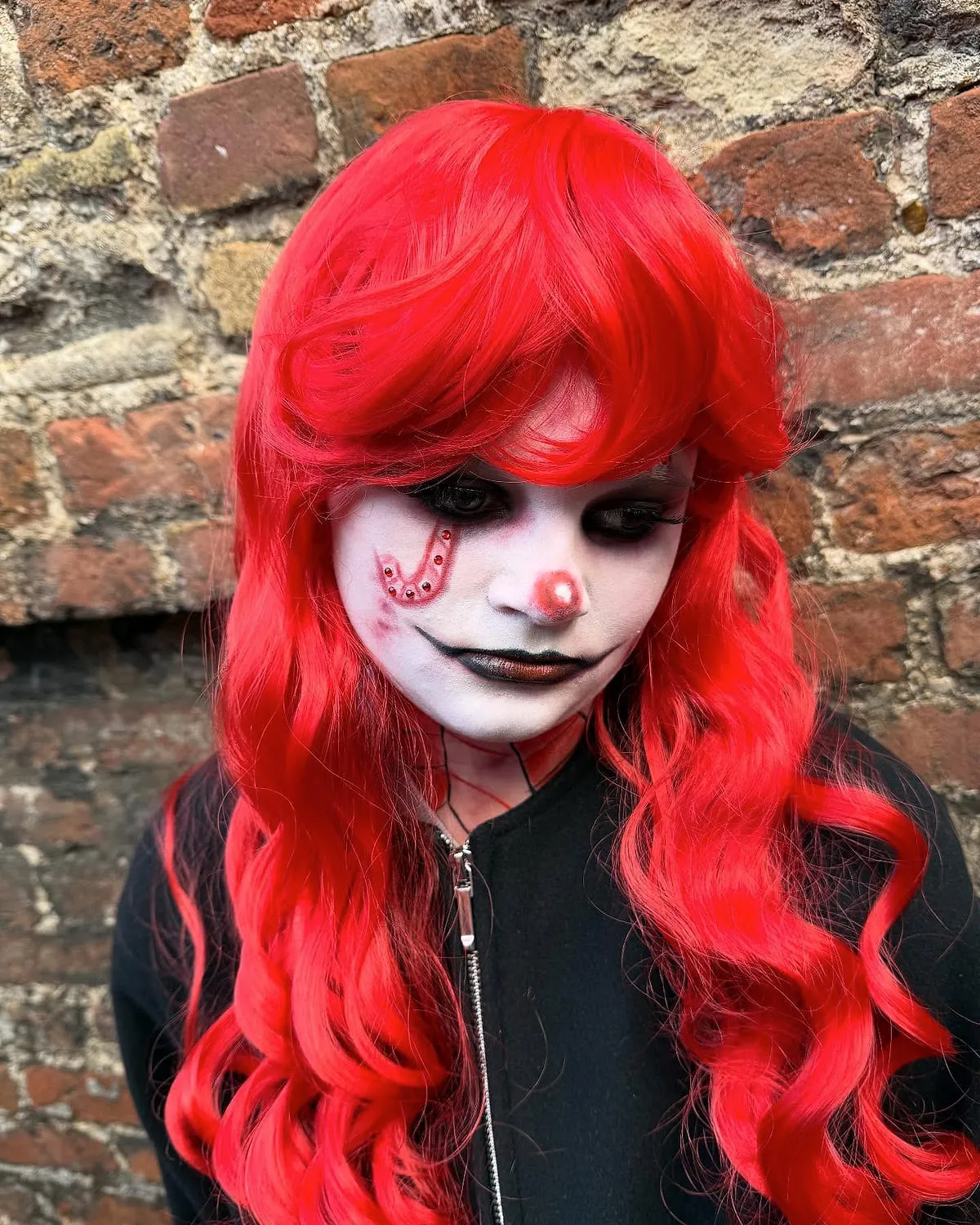 Halloween special-effects makeup: a red-haired clown character