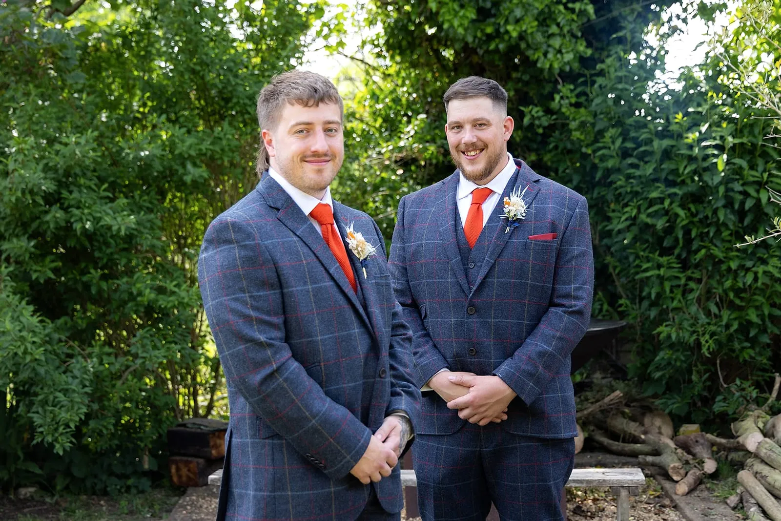Two grooms photographed together on their wedding day
